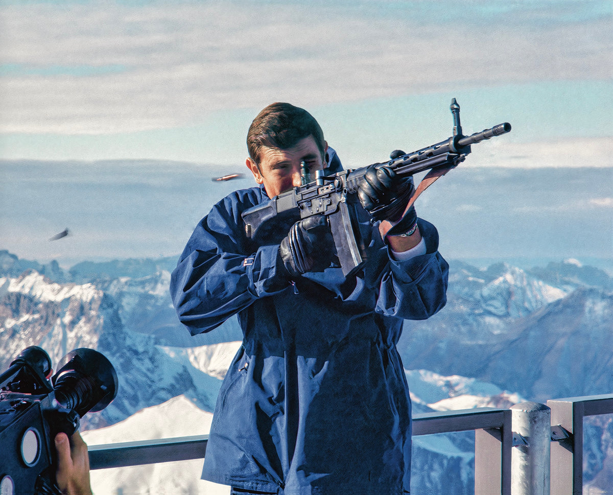 Poster: George Lazenby as James Bond with a Swiss StGw 57